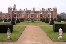 The grand Felbrigg Hall, a stunning National Trust property with extensive gardens and parkland, perfect for a historic day out near Hays Wood Retreat in Norfolk.