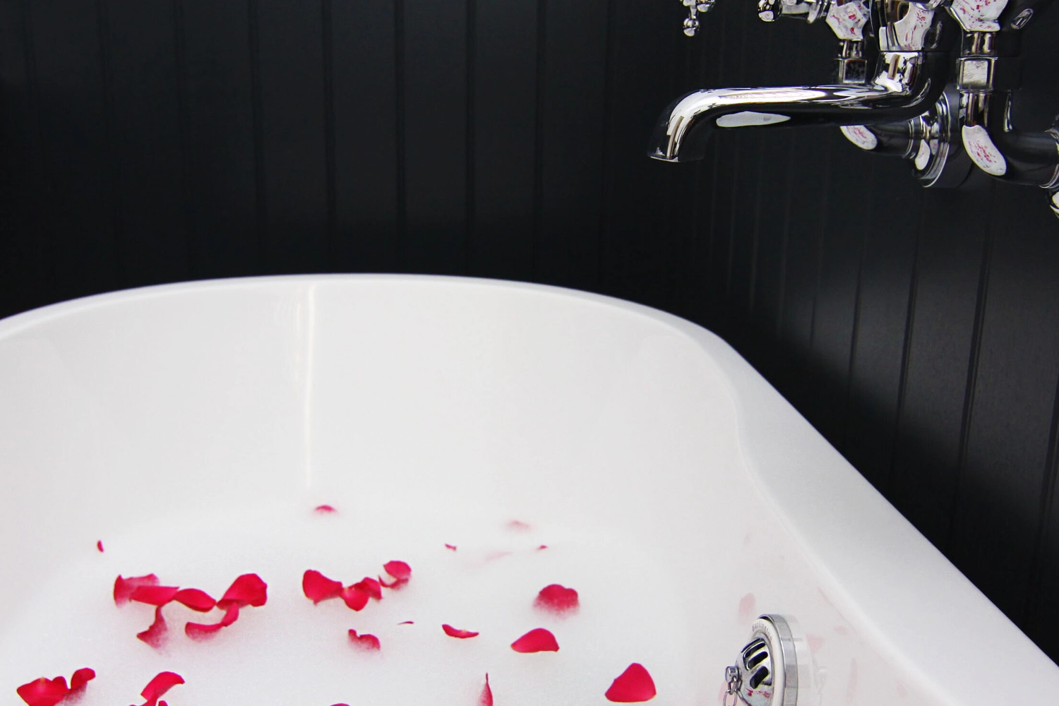 Modern bathroom design with a stunning free-standing bath in our Norfolk holiday lodge, offering a spa-like experience at Hays Wood Retreat.
