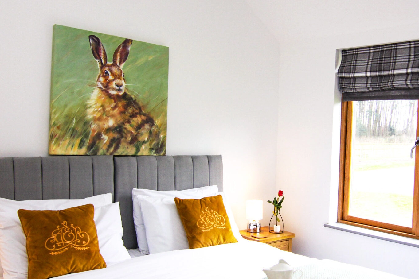 The inviting super king bed in one of the bedrooms of our 2-bedroom lodge, promising deep rest and relaxation during your self-catering holiday at Hays Wood Retreat in Norfolk.